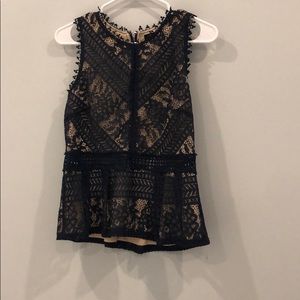 Navy blue lace peplum top with nude underlay